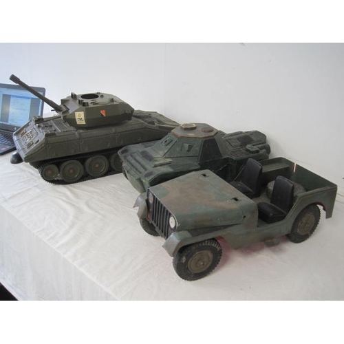 275 - A selection of vehicles for Action Man or similar, 1970s, comprising a tank, an armoured car and a j... 