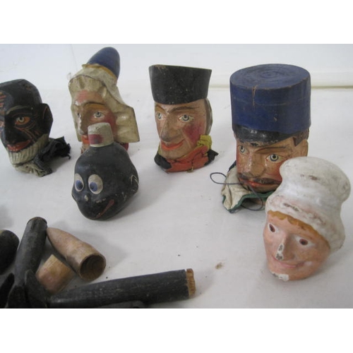 295 - A selection of wooden heads from Punch & Judy puppets, plus assorted arms and legs in wood for the s... 