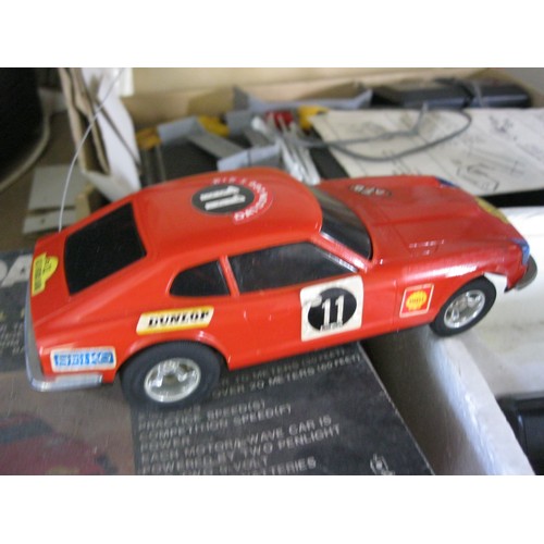 127 - A Motora Wave Radio Controlled Datsun 280Z, in original box, complete plus a Superspeed Grand Prix c... 