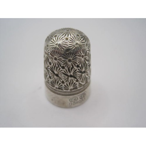 173 - A Charles Horner thimble, not marked but in silver, marked CH 10 Dorcas and engraved to base 'Enid 2... 