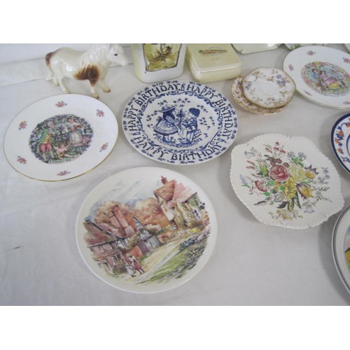 56 - About twelve decorative plates (including Poole and Royal Doulton valentine), a Crown Devon trinket ... 