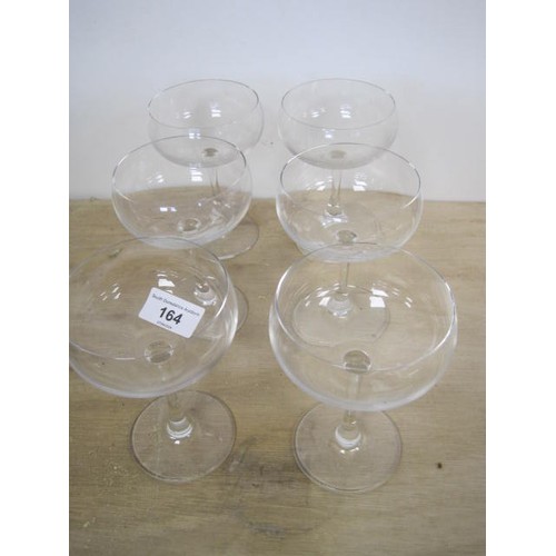 164 - A set of six Spiegelau glass champagne coupes. Occasional very slight a/f touches where the glasses ... 