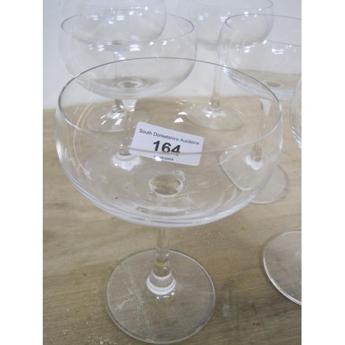 164 - A set of six Spiegelau glass champagne coupes. Occasional very slight a/f touches where the glasses ... 