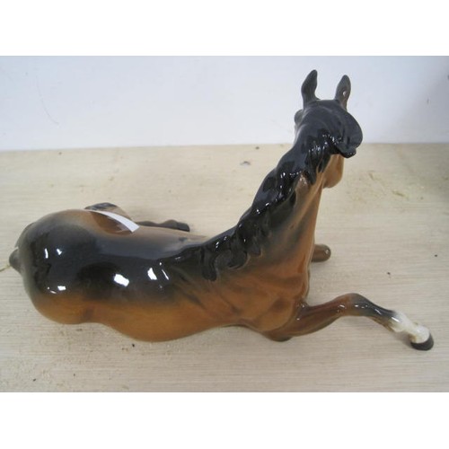 156 - Beswick model of recumbent chestnut mare. Height 12cm, length 24.5cm. Very good condition.