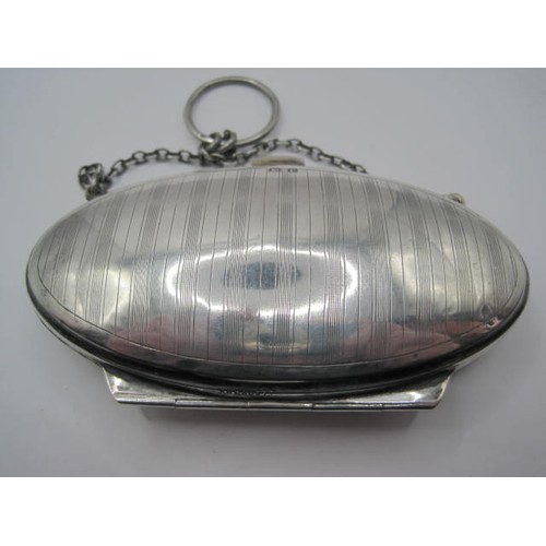 188 - An impressive sterling silver lady's purse with chain, engine turned decoration, the cartouche engra... 