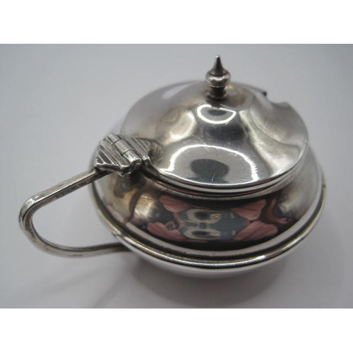 183 - A Sterling Silver Mustard Pot with fitted blue glass liner, hallmarked for Birmingham 1932, possibly... 