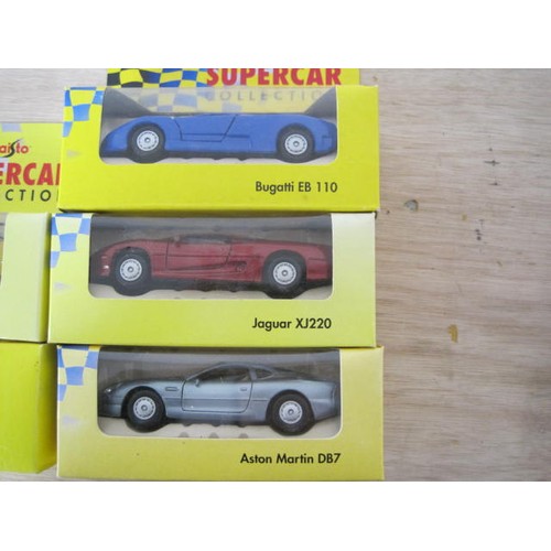 301 - Eight Maisto Supercar Collection model cars in original boxes - 2 x Bugatti EB110, MG RV8, Ferrari F... 