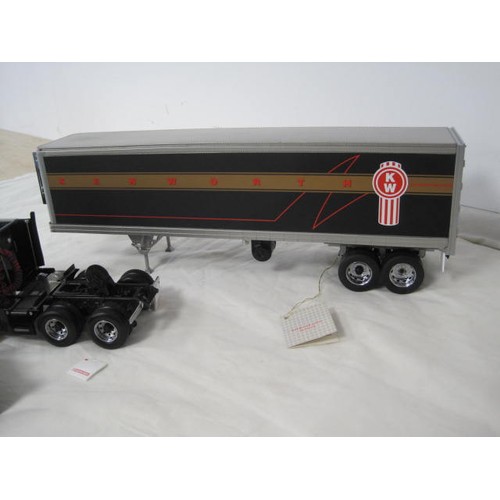 309 - Franklin Mint Precision Models 1997 Kenworth T600 tractor and trailer, with labels and certificate o... 