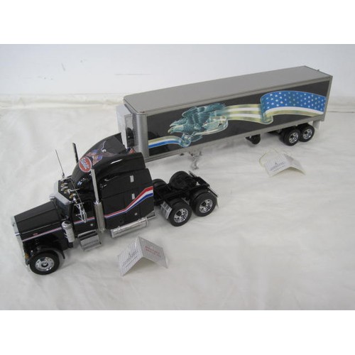 310 - Franklin Mint Precision Models Peterbilt model 379 tractor and refrigerated trailer. With labels, ve... 