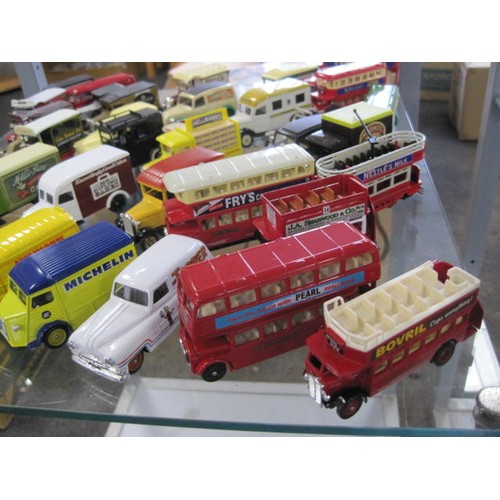 98 - A large selection of 'Days Gone' vehicles (six are boxed).
Mostly trams and buses