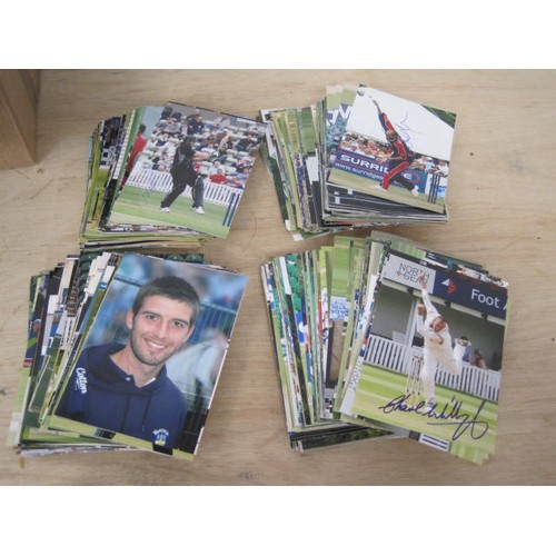 145 - Several hundred signed action photographs from modern day cricket including international players