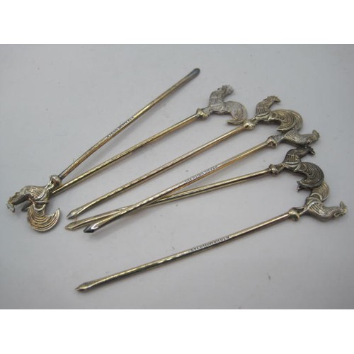 40 - Set of six cocktail sticks with cockerel finials, each stamped sterling silver, length 8.3cm, combin... 