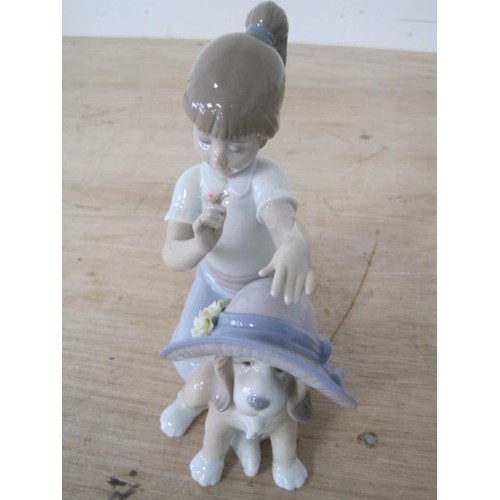 16 - Lladro Puppy with a bonnett