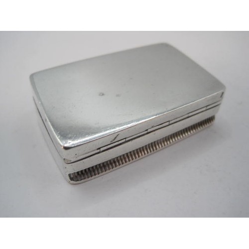 86 - A plain silver snuff box with hinged lid, gilt interior, match strike to back edge, 5cm x 3.2cm x 1.... 