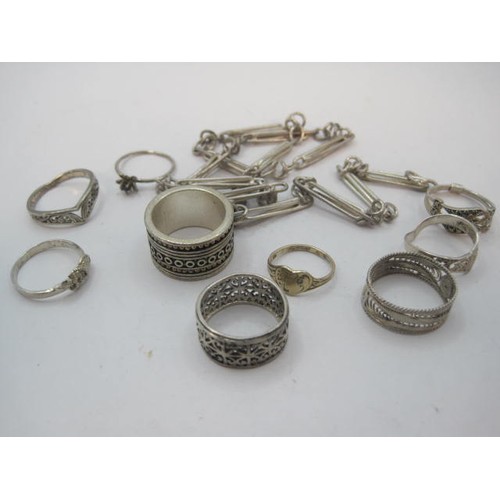 95 - 925 silver necklace and nine silver and white metal rings - the necklace about 42.5cm with twelve lo... 