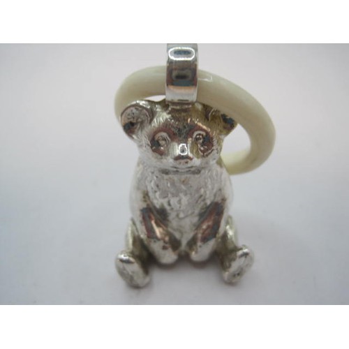 97 - Imported silver bear teether - the bear in a seated position, height including suspension bow 4.8cm,... 