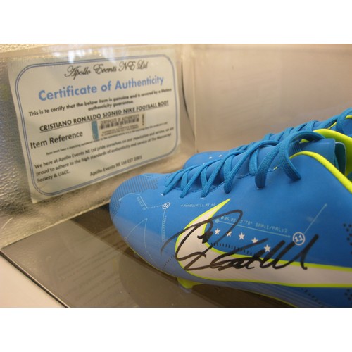 2 - A pair of Nike football boots signed by Cristiano Ronaldo, cased, with certificate of authenticity, ... 