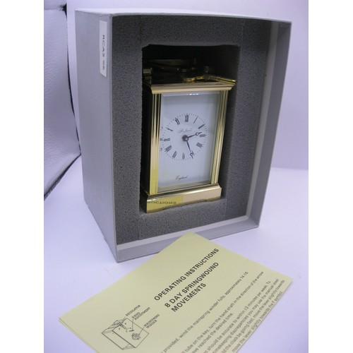 5 - A St James of London heavy brass carriage clock in original box and packaging, 8 day movement, never... 