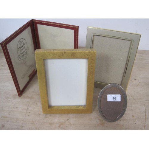 68 - Four photo frames including an oval silver one