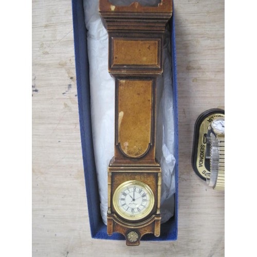 115 - A Sekonda Ladies watch in original box  plus a resin mini grandfather clock with mini quartz movemen... 