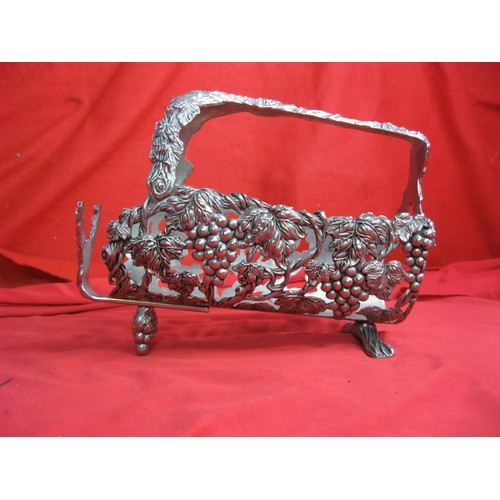 203 - An electroplated wine bottle holder moulded with vines and grapes, adjustable neck bracket.