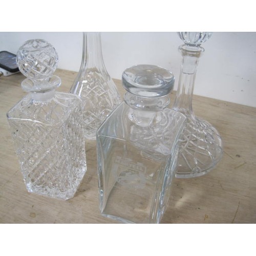 119 - A series of decanters including a ships decanter all as per pictures