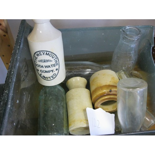 122 - A selection of old pottery and glass bottles including some of local interest for the Weymouth area.