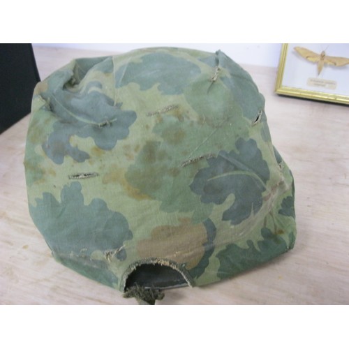 227 - A post-WW2 US M1 Helmet with liner, chinstrap and camouflage cover, in good order