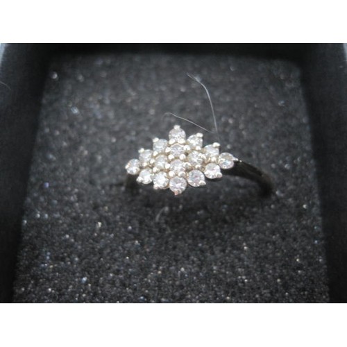 34 - 9 carat gold diamond cluster ring set with sixteen small diamonds in a lozenge shape setting, size N... 