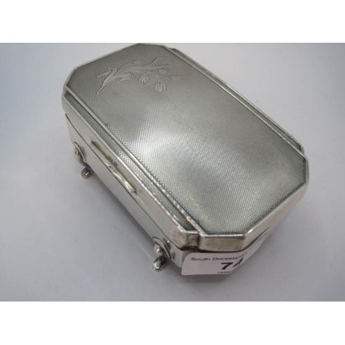 74 - Silver jewellery box with hinged engine turned lid engraved with tulips, original fabric lined inter... 