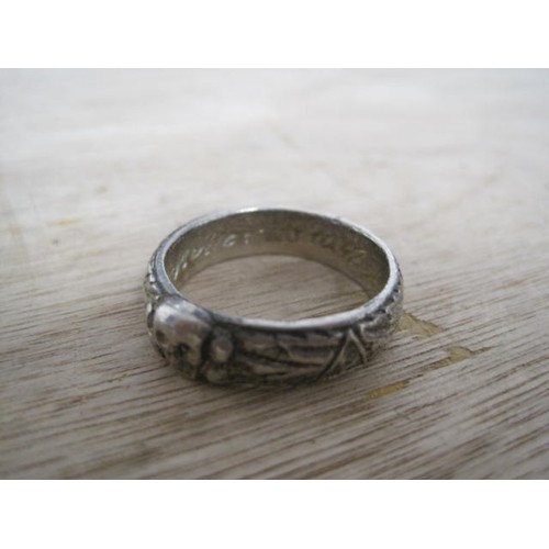 234 - A pair of rings in the style of SS Honour Rings, possibly in low grade silver, internally inscribed ... 