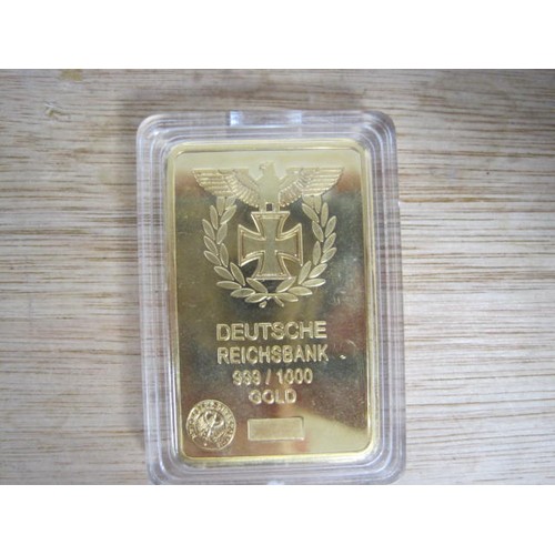 238 - A Deutsche Reichsbank ingot marked .999/1000 gold which is pretty unlikely to be gold (!), a reprodu... 