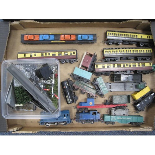 240 - Two trays containing an assortment of model railway items including track, engines, controller, buil... 