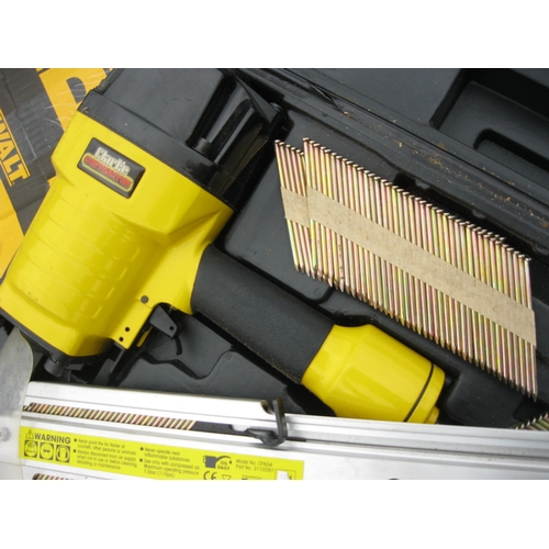 15 - A First Fix Nail Gun, cased, with nails, in full working order