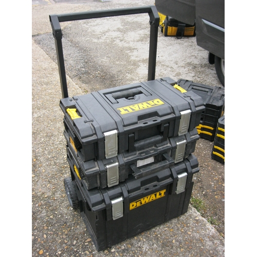 23 - A DeWalt wheeled tool chest with three sections