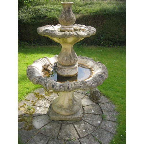 1 - Two-tier stoneware garden fountain, baluster base, support and top with stylized foliage carving in ... 
