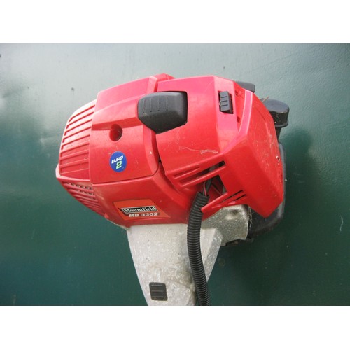 34 - A large Mountfield MB3302 heavy duty petrol driven strimmer