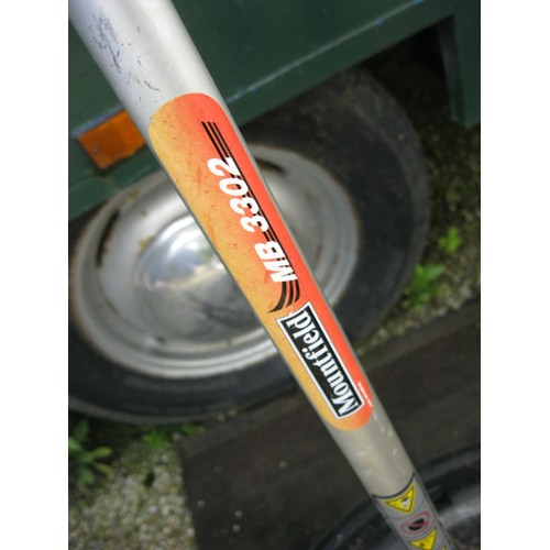 34 - A large Mountfield MB3302 heavy duty petrol driven strimmer