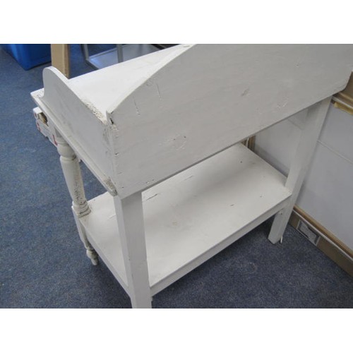 48 - A white-painted antique wash stand in solid condition