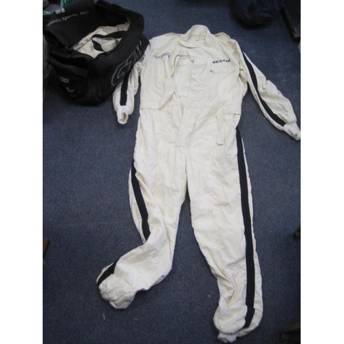 51 - Motor Racing Interest - A white FIA approved motor racing coverall branded for Goodwood and Dunlop, ... 