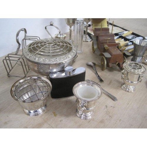 158 - Assorted electroplated and metal ware, including goblets, boiled egg stand, flower arrangers, a smal... 