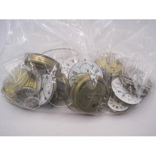 243 - Bag of watch movements and crystals (wrist and pocket). Not tested.