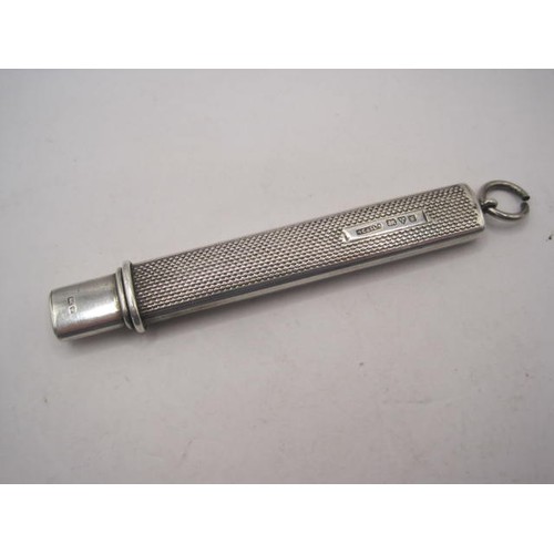 244 - Silver chatelaine or fob pencil holder, oblong, engine turned, length 77mm excluding loop, 14.8g, ma... 