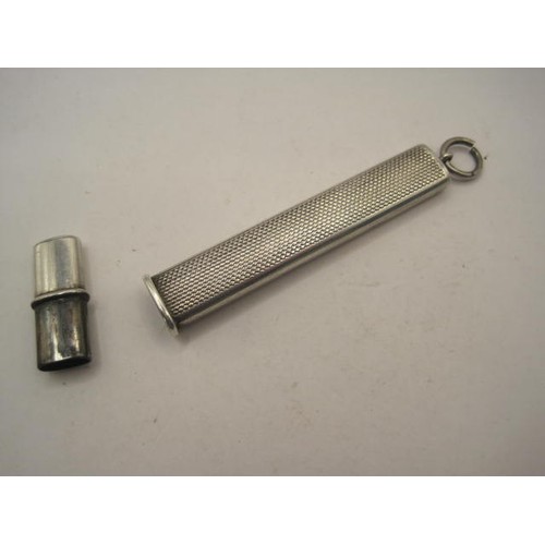 244 - Silver chatelaine or fob pencil holder, oblong, engine turned, length 77mm excluding loop, 14.8g, ma... 