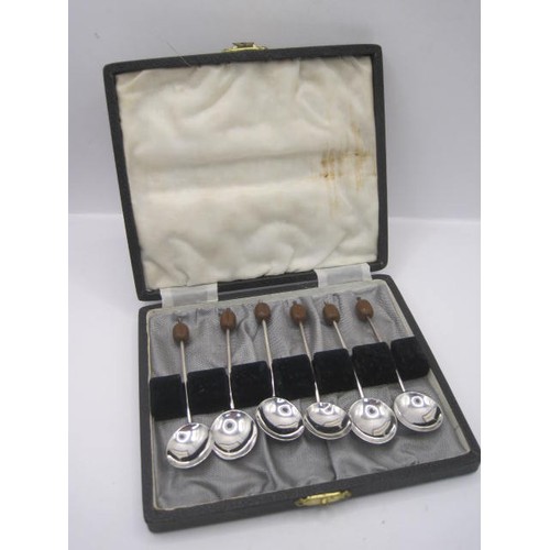 249 - Cased set of six silver coffee spoons with bean terminals, combined gross weight 37.5g. A/f, some of... 