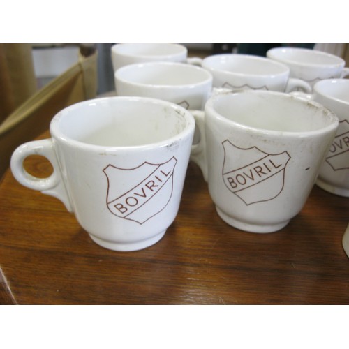 97 - 9 vintage Bovril branded cups and a Arthur Meakin Horlicks branded mug