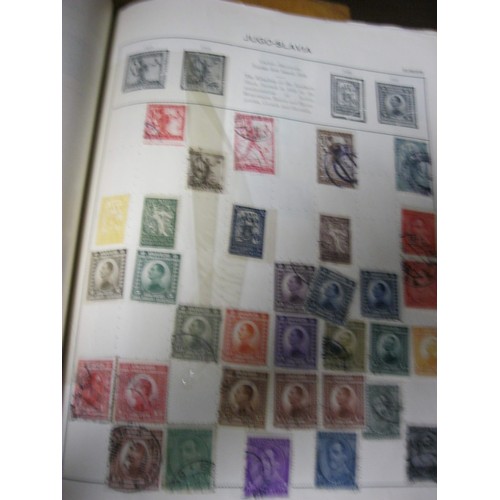 214 - A Triumph stamp album containing a large selection of stamps including some interesting early Britis... 