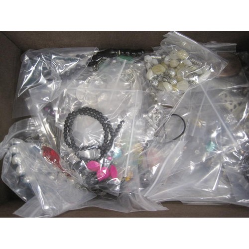 111 - Assorted costume jewellery, necklaces, bangles, pendants etc, contained in a dark brown leatherette ... 