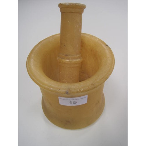 15 - Alabaster or similar stone mortar and pestle (a/f). Height of mortar 12cm, length of pestle 16.5cm. ... 