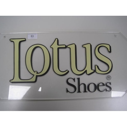 63 - Lotus shoes advertising - a clear acrylic wall-mounting advertising sign printed in black and yellow... 